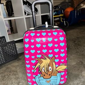 child’s rolling pony suitcase
